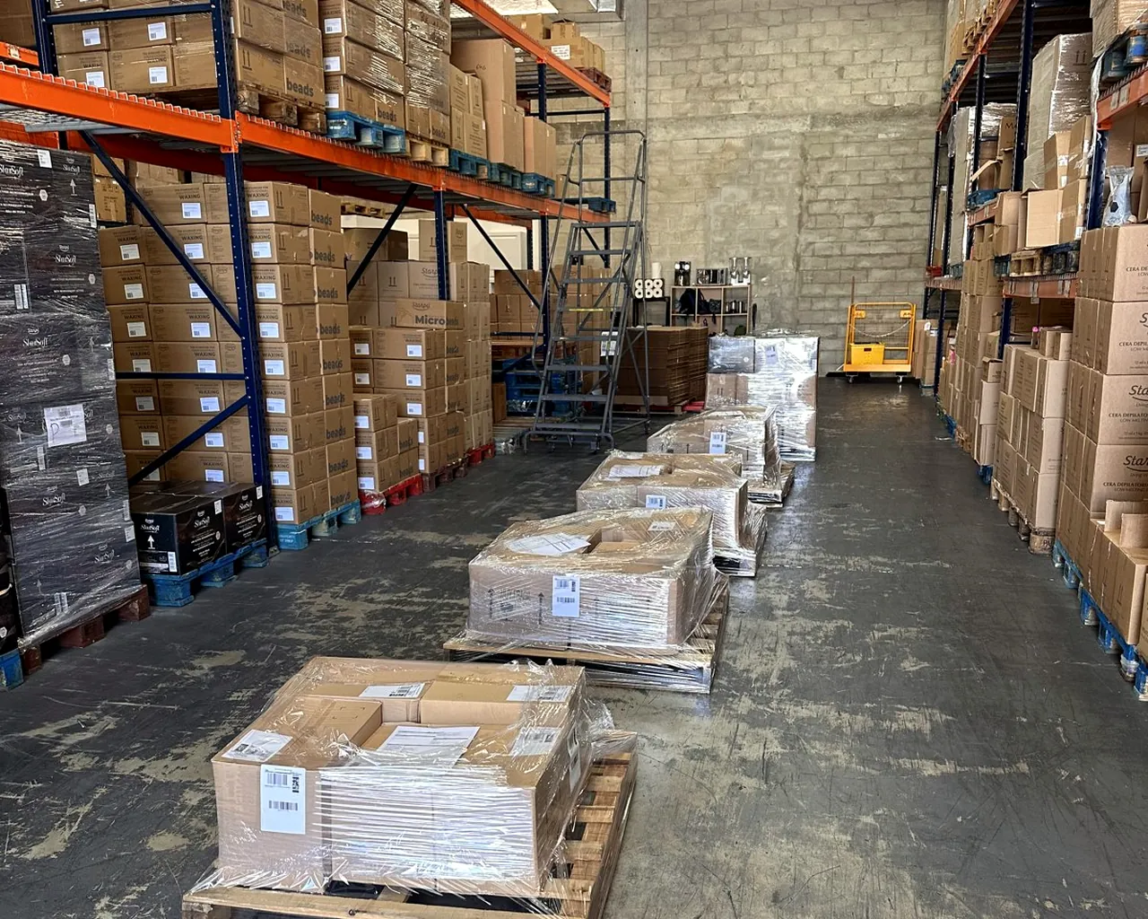 Pallet racking and inventory storage aisle at Marcana 3PL Miami